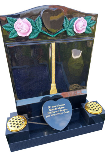 Book headstone with carved 